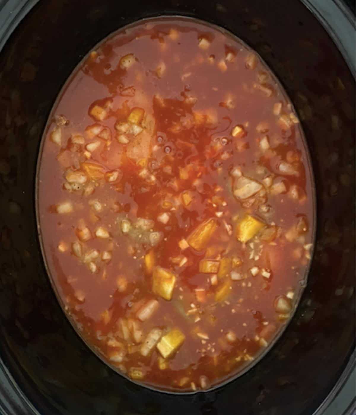 chicken enchiladas in slow cooker before cooking