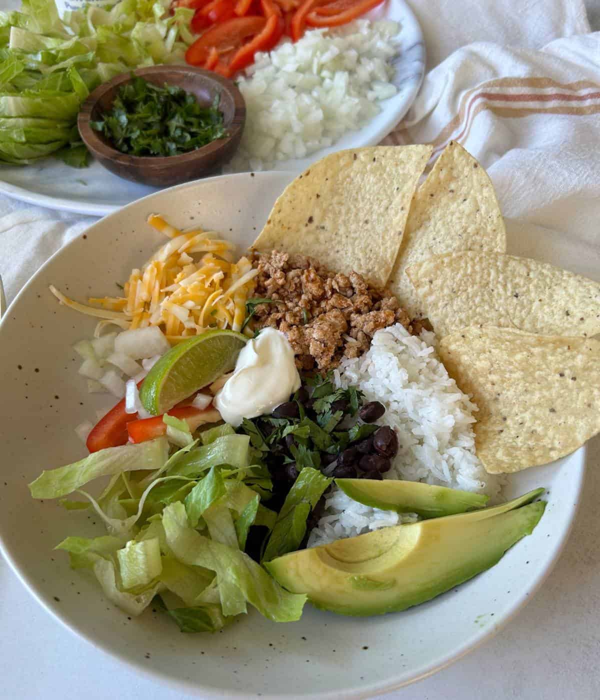 Turkey rice bowls with tortilla chips. 
