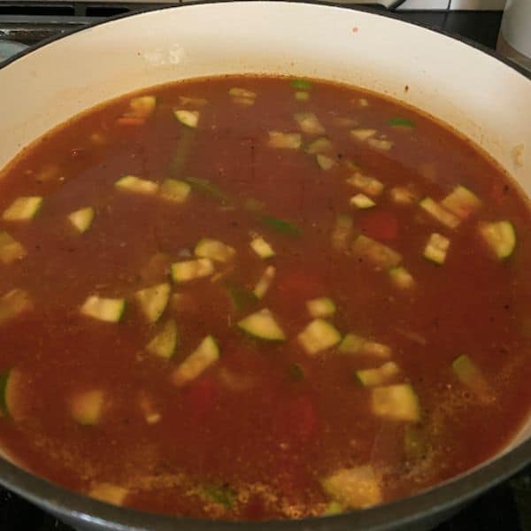 soup after adding tomato sauce and chicken stock