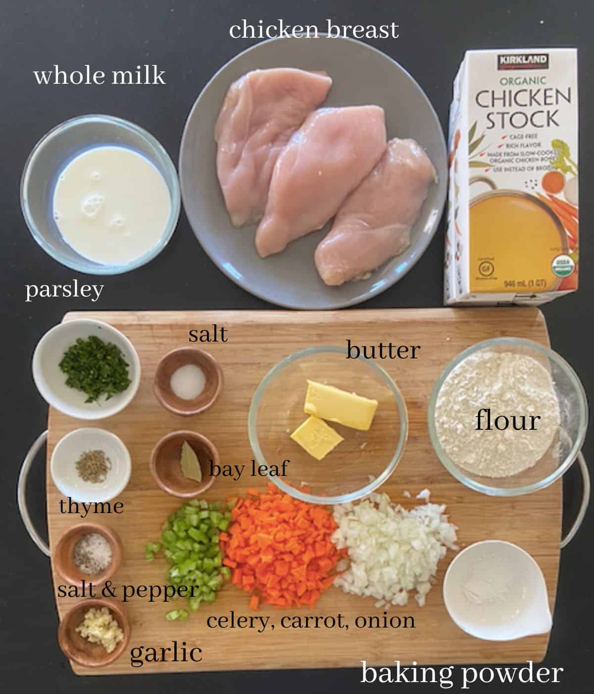 chicken and dumpling soup ingredients on cutting board with text