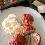 turkey meatloaf muffins on plate with mashed potatoes