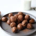 plate of stacked almond butter energy balls