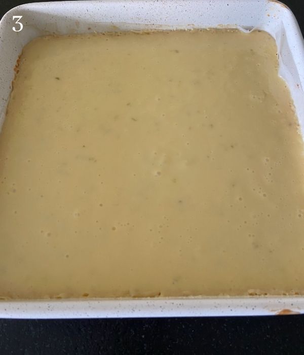 key lime pie bars after baking in pan