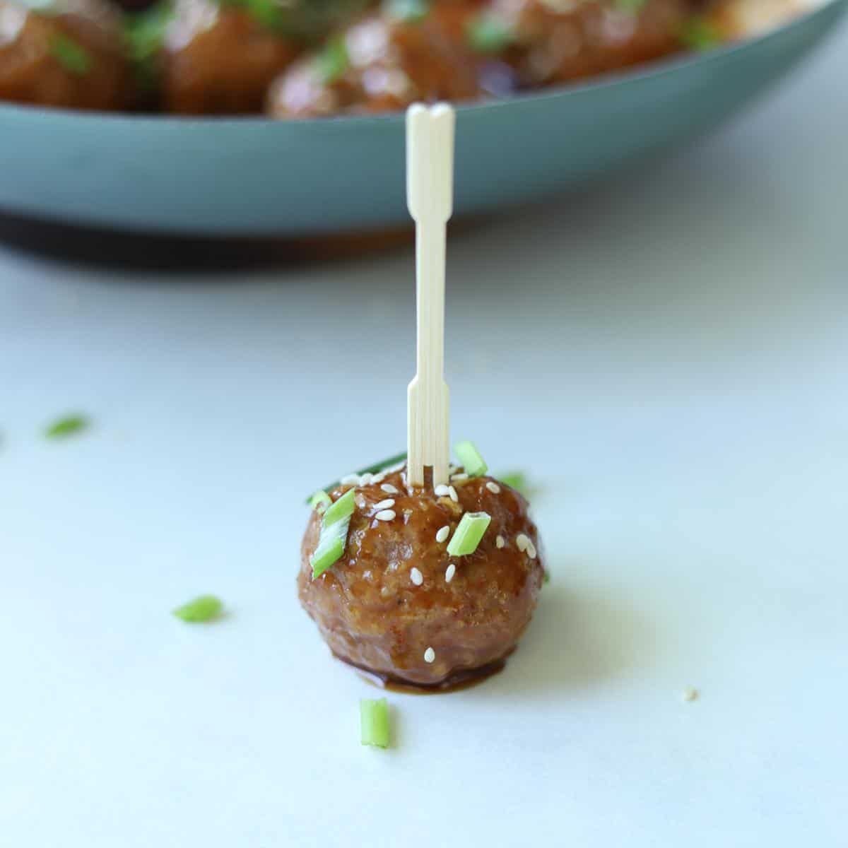 meatball with a toothpick stuck into it