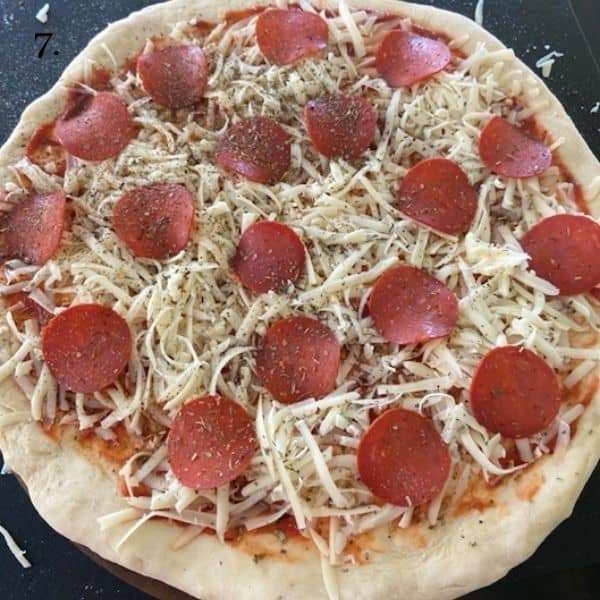 pizza with sauce cheese and pepperoni