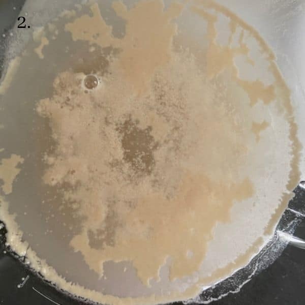 yeast beginning to bubble & foam in water