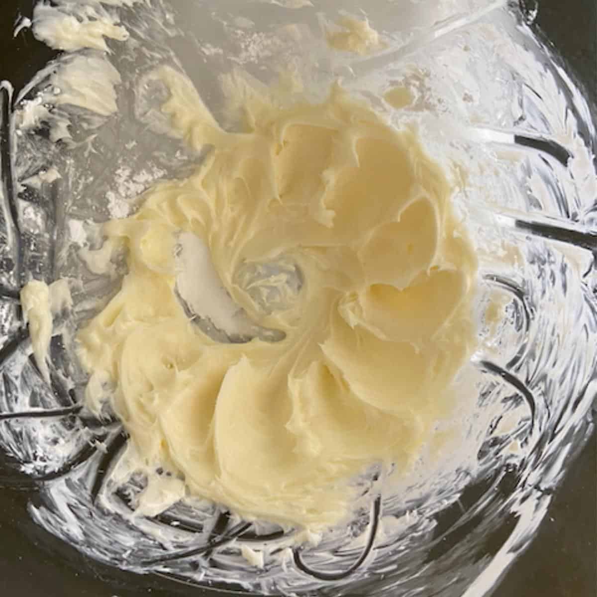 cream cheese and powdered sugar whipped in stand mixer bowl