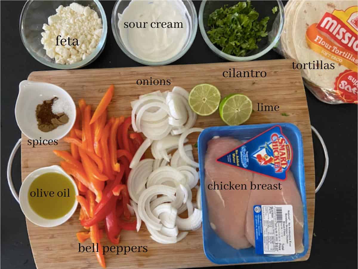 chicken fajita wrap ingredients with text on countertop