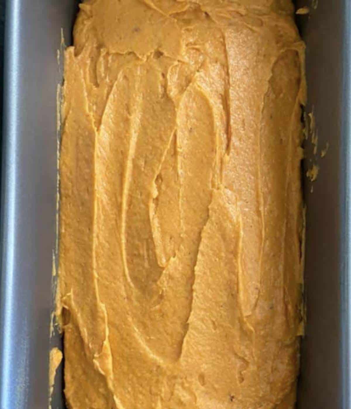 Pumpkin bread batter in pan.