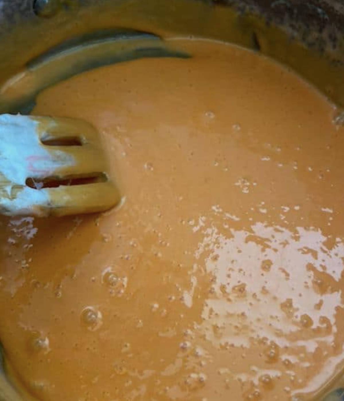 Orange Marshmallow filling in pot. 