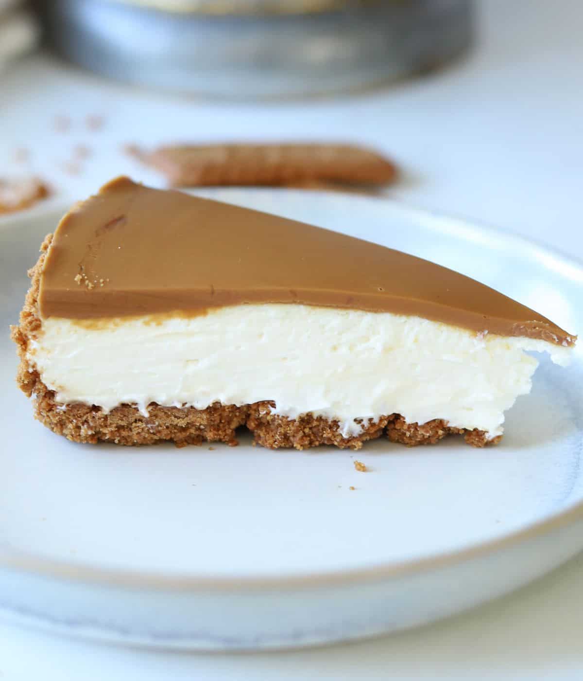 slice of biscoff cheesecake on plate