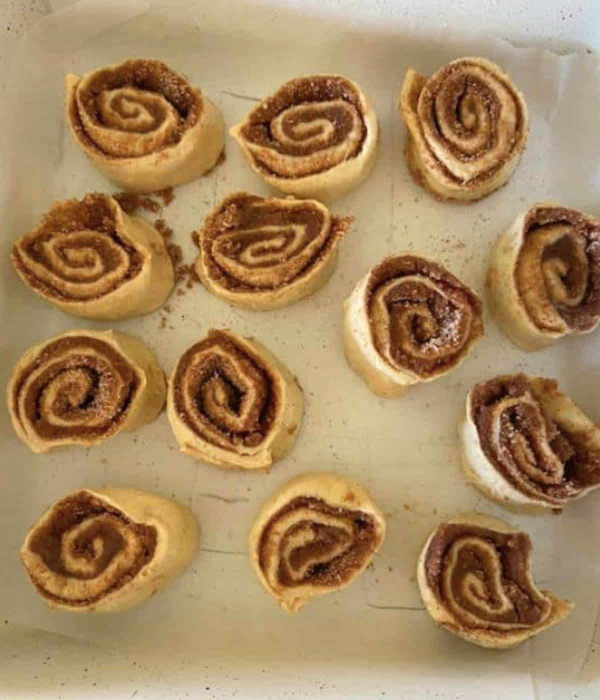 Crescent roll Cinnamon rolls in pan ready to bake.