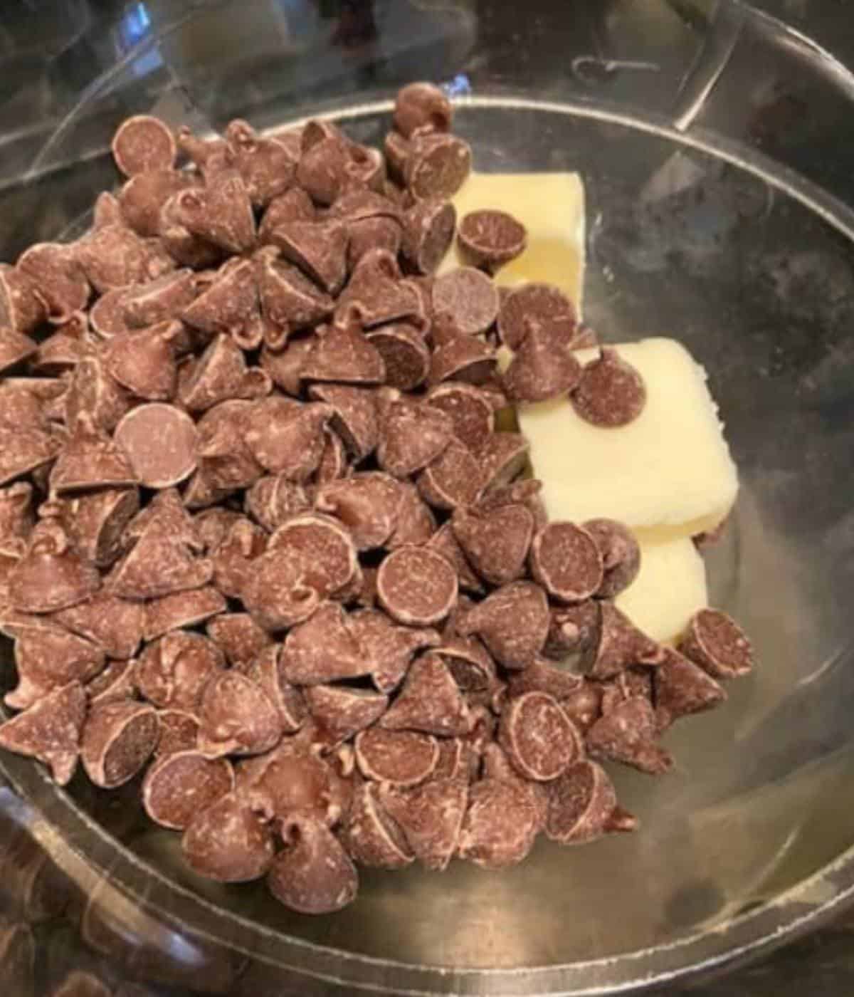 Chocolate chips and butter in double boiler. 