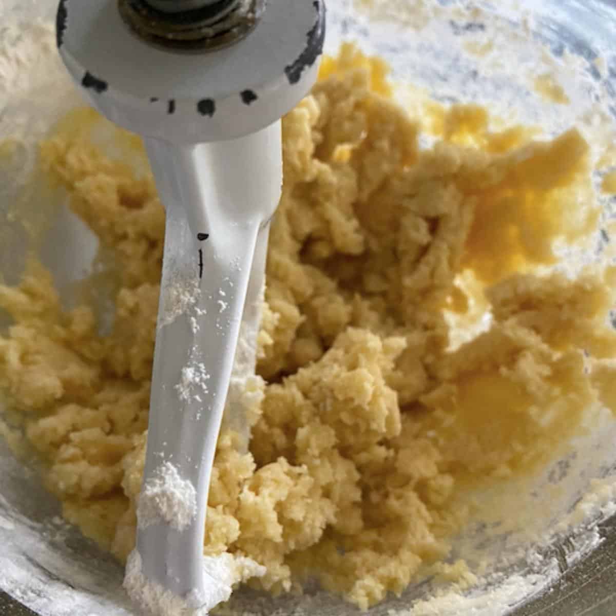 cookie dough mixed together in glass bowl