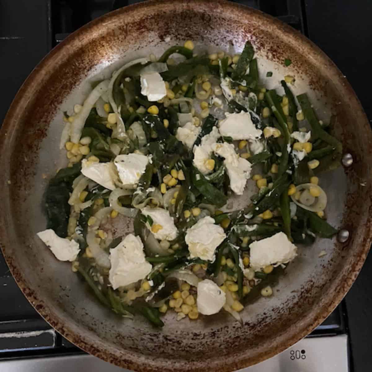 cream cheese added into skillet