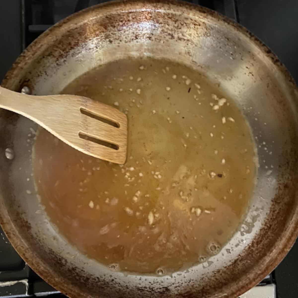 skillet with white wine sauce