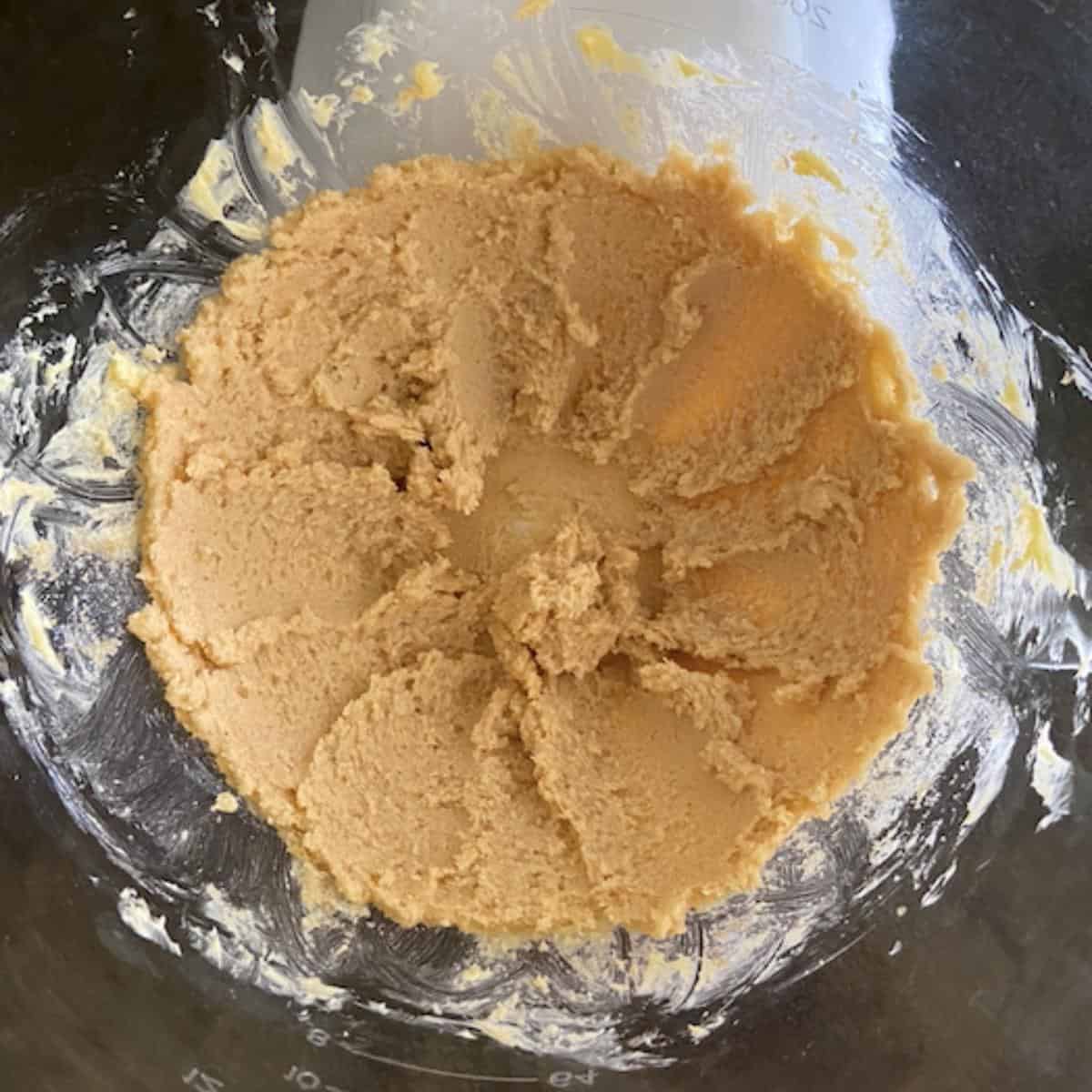 butter and sugars creamed together in stand mixer bowl