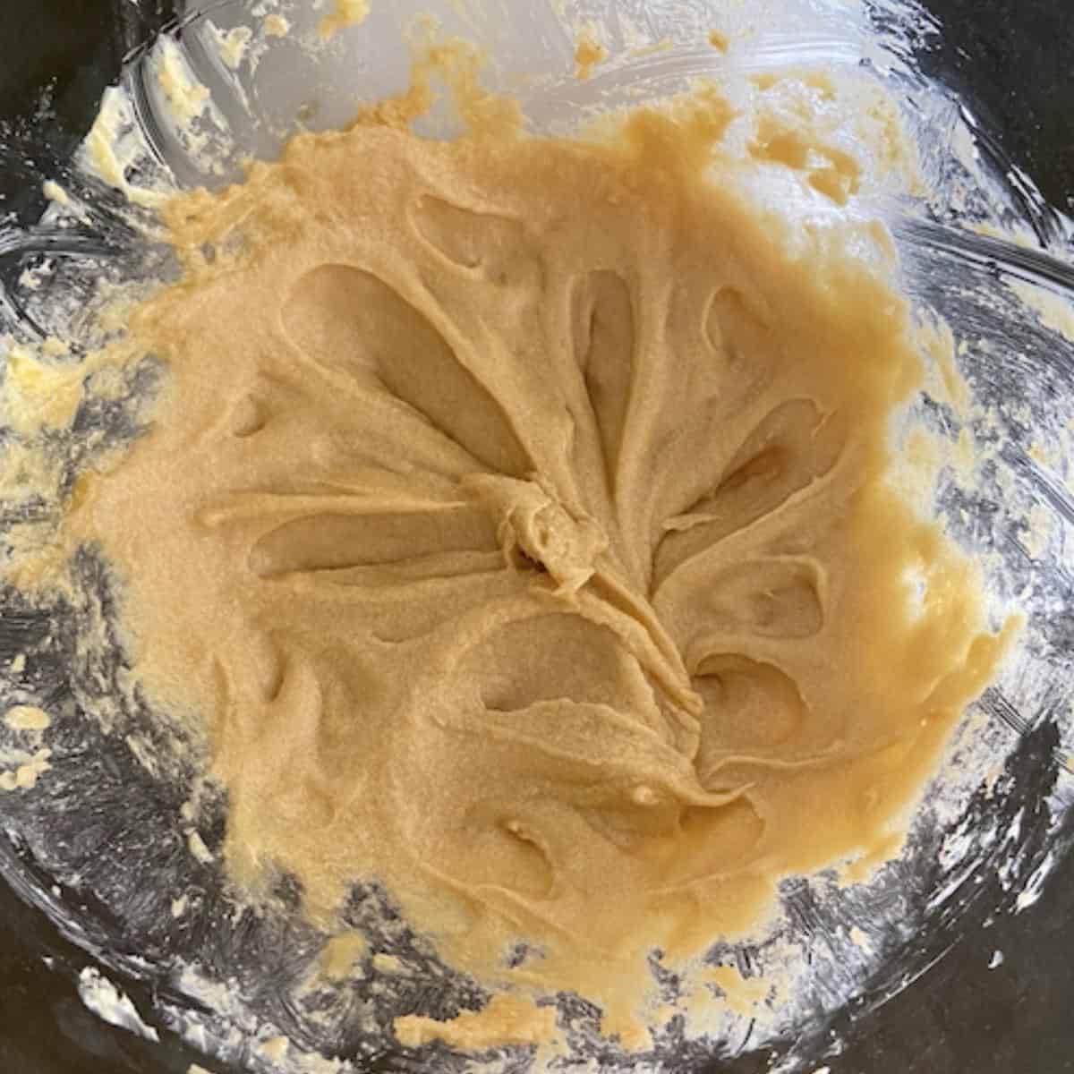 wet ingredients blended together in stand mixer bowl