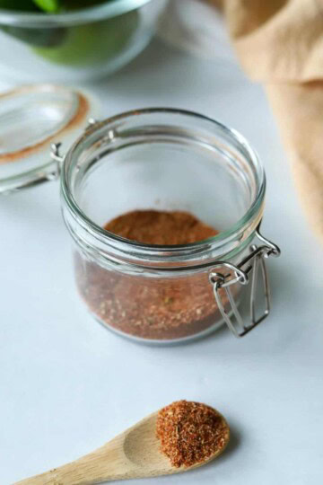 glass jar full of taco seasoning
