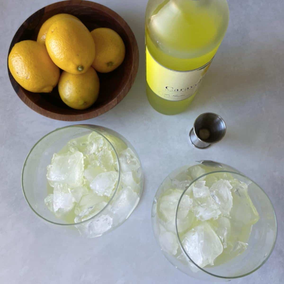 overhead view of glasses filled with ice and limoncello