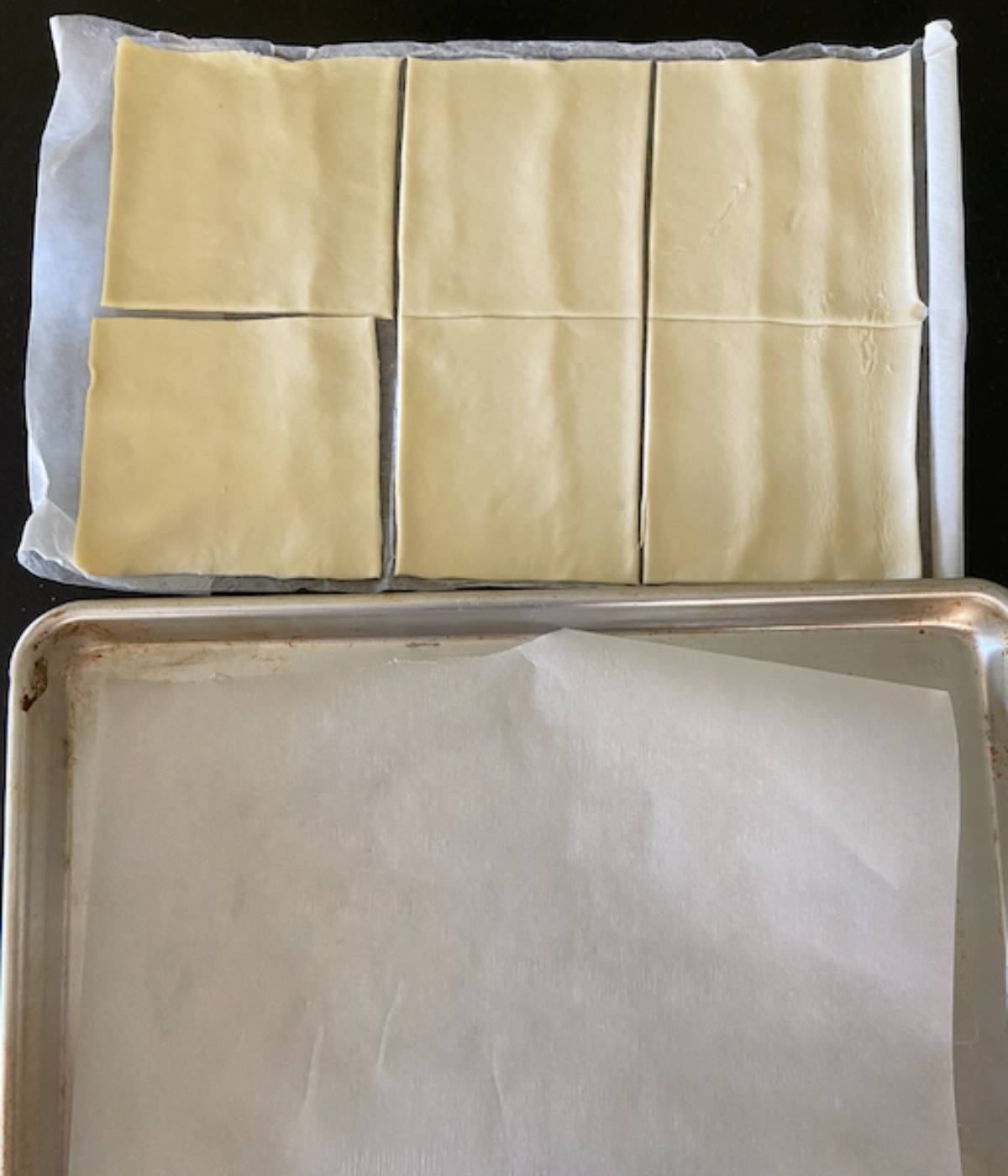 Puff pastry cut into 6 equal squares and cookie sheet covered with parchment paper.