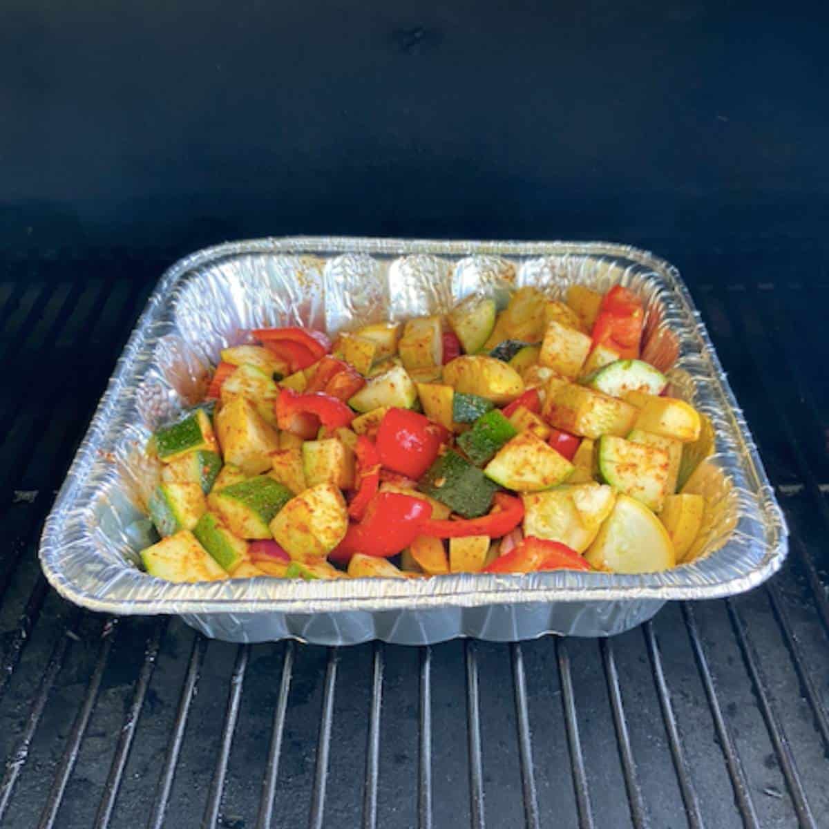 Vegetable tray in smoker.