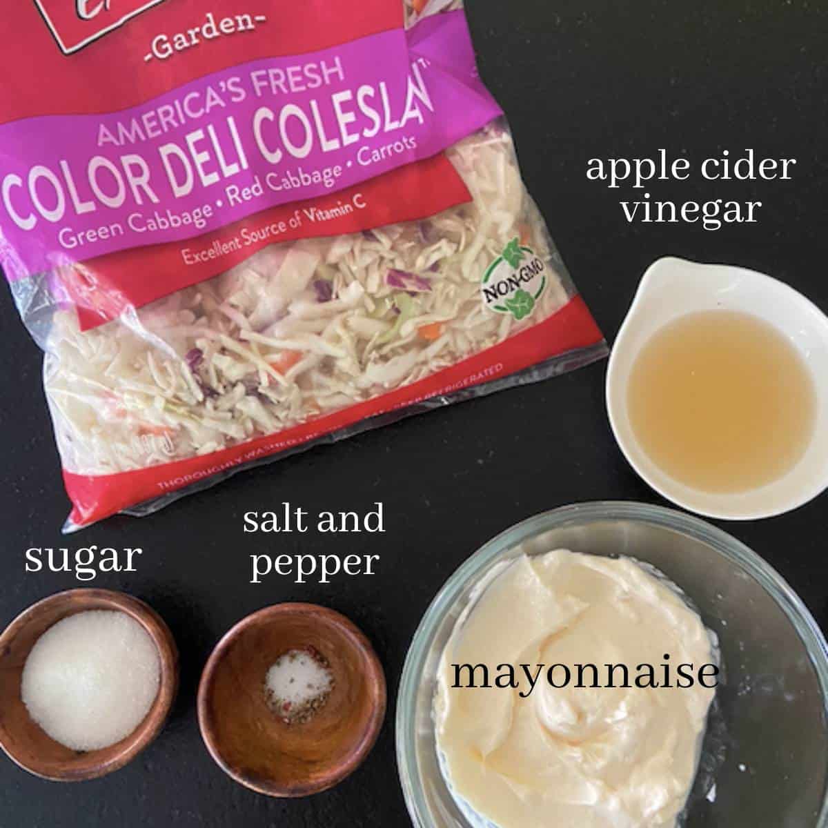 Coleslaw ingredients on countertop.