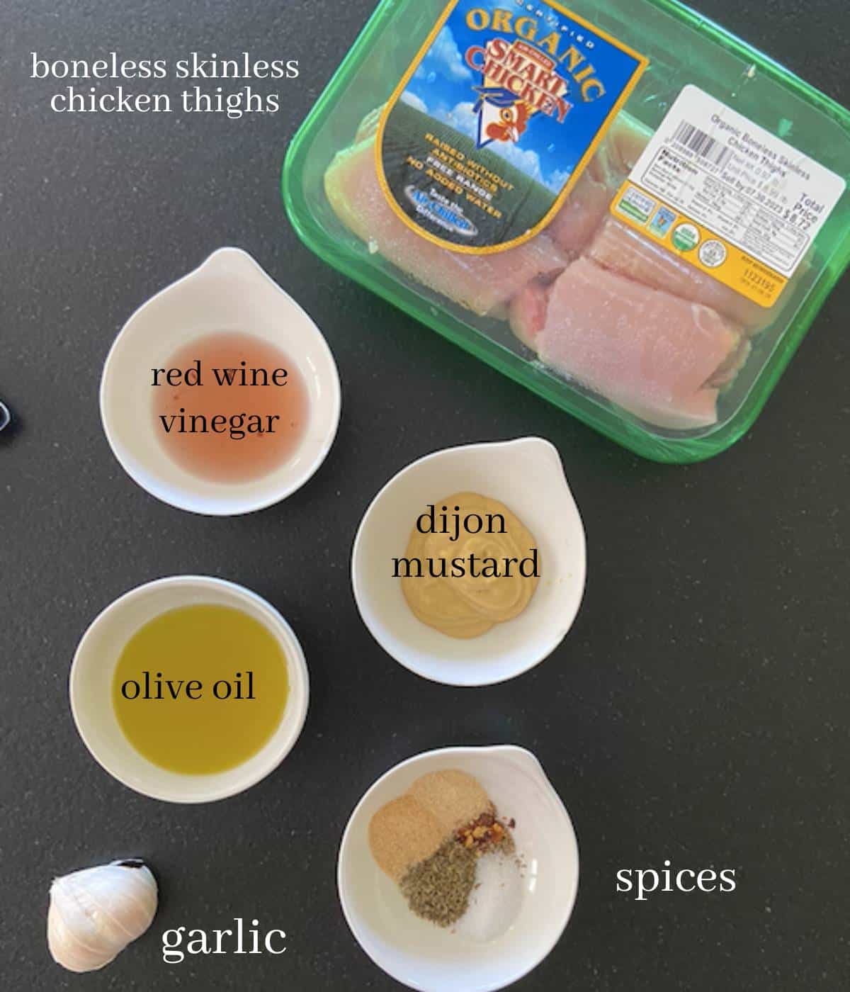 Boneless chicken thigh recipe ingredients on countertop.