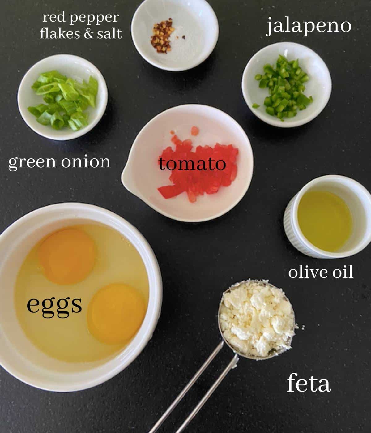 Ingredients for feta eggs on countertop.