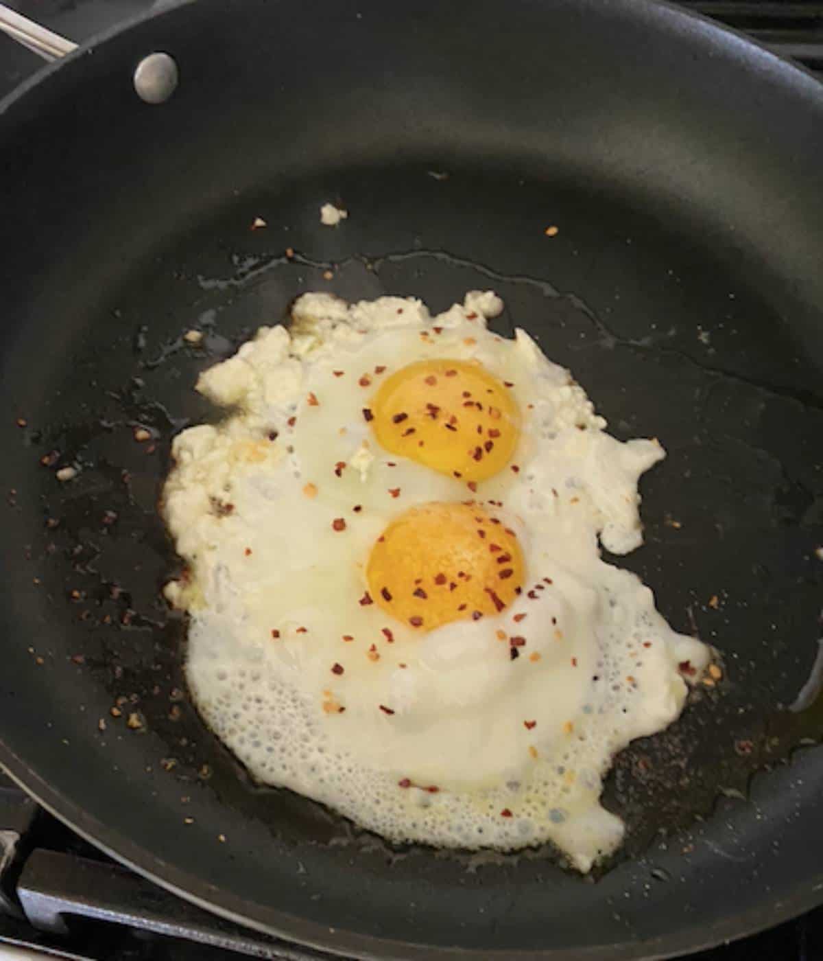 Olive Oil added into fried egg pan.