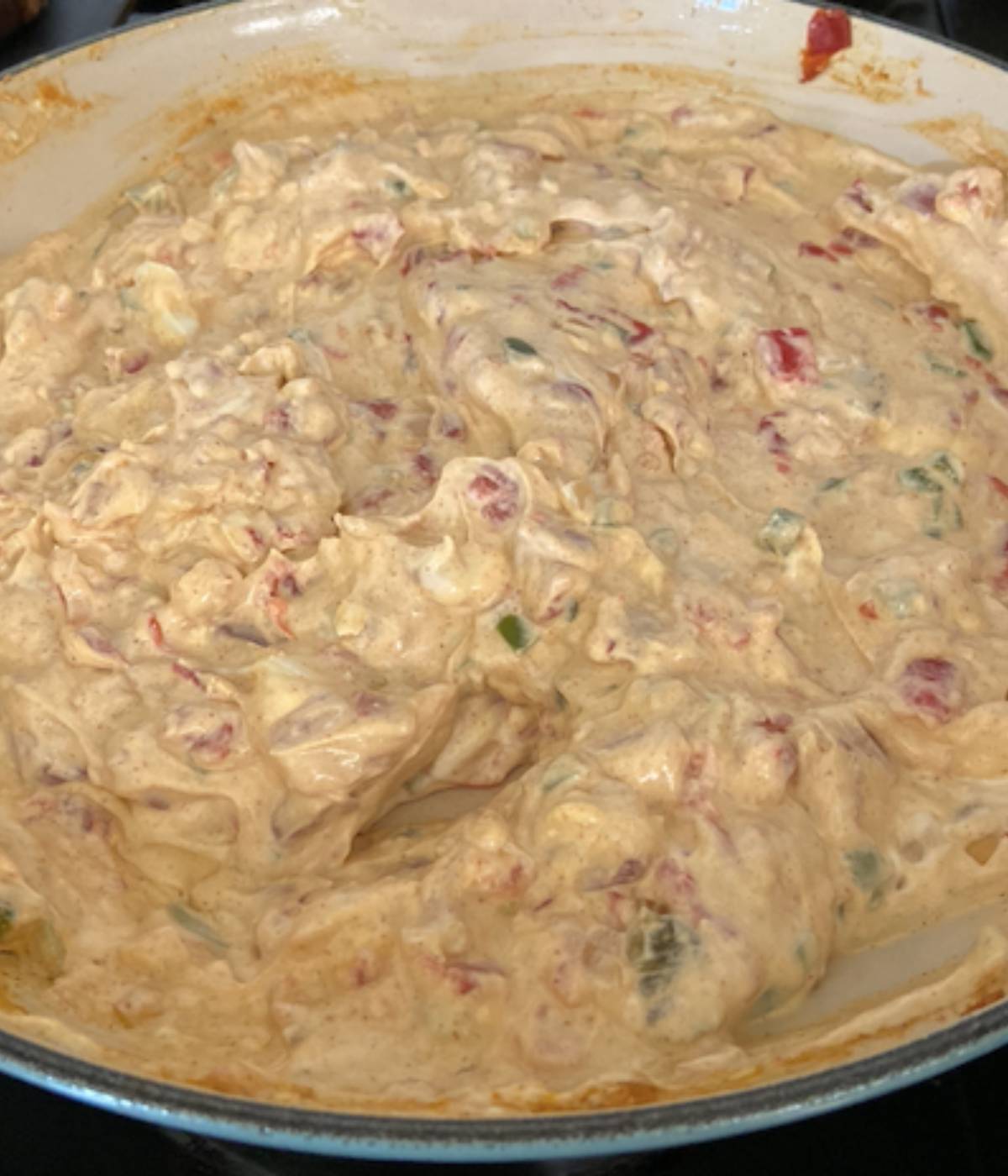 Cream cheese added into jalapeno dip.