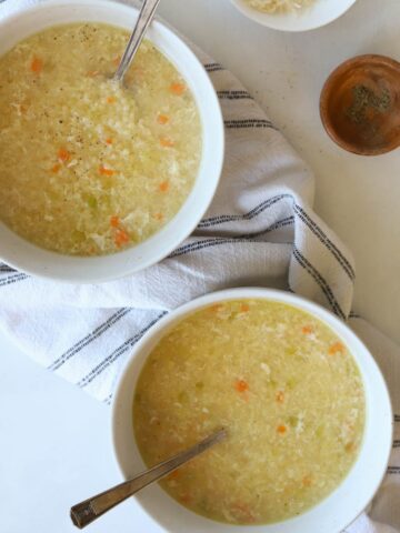 Two bowls of pastina soup.