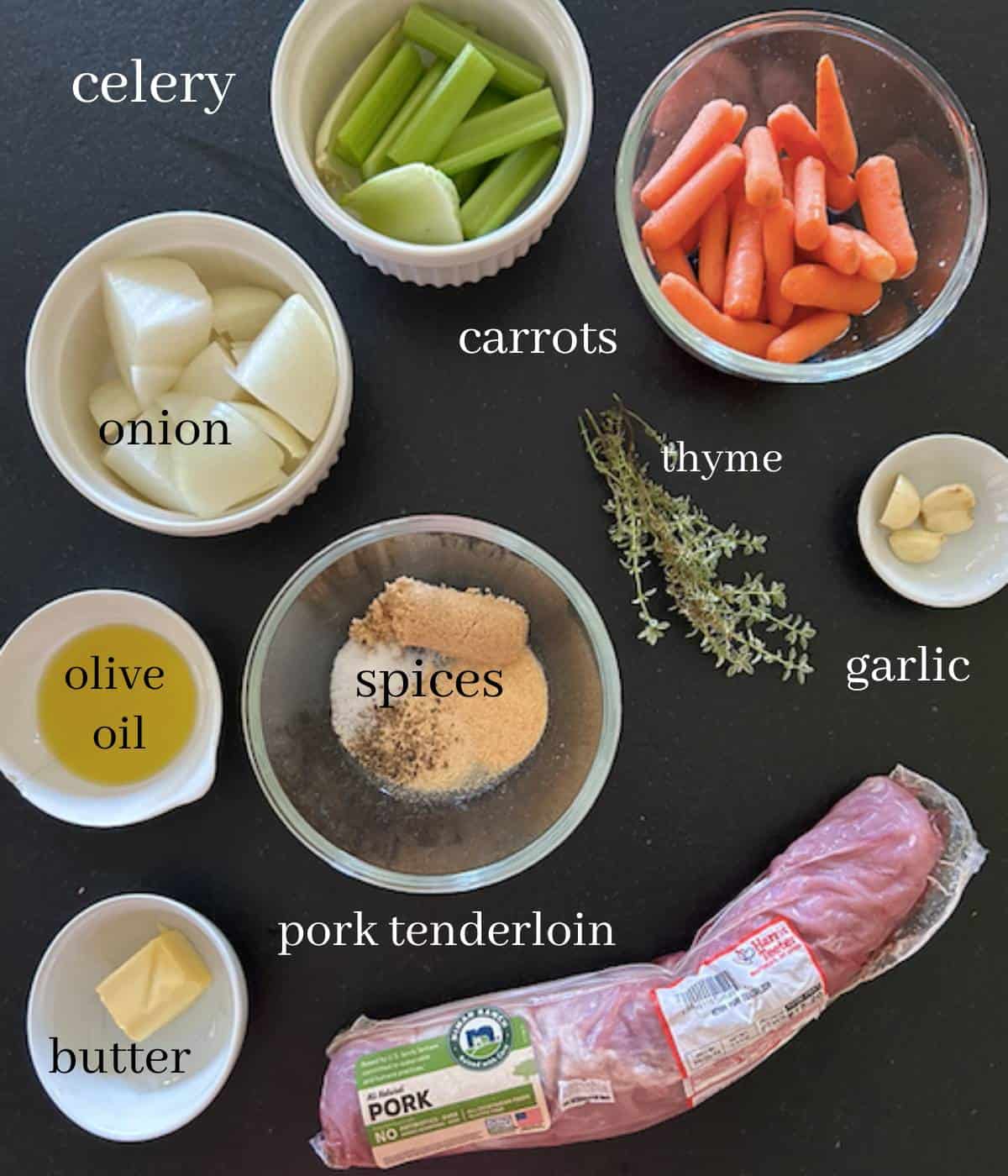 Ingredients for pork tenderloin on countertop.