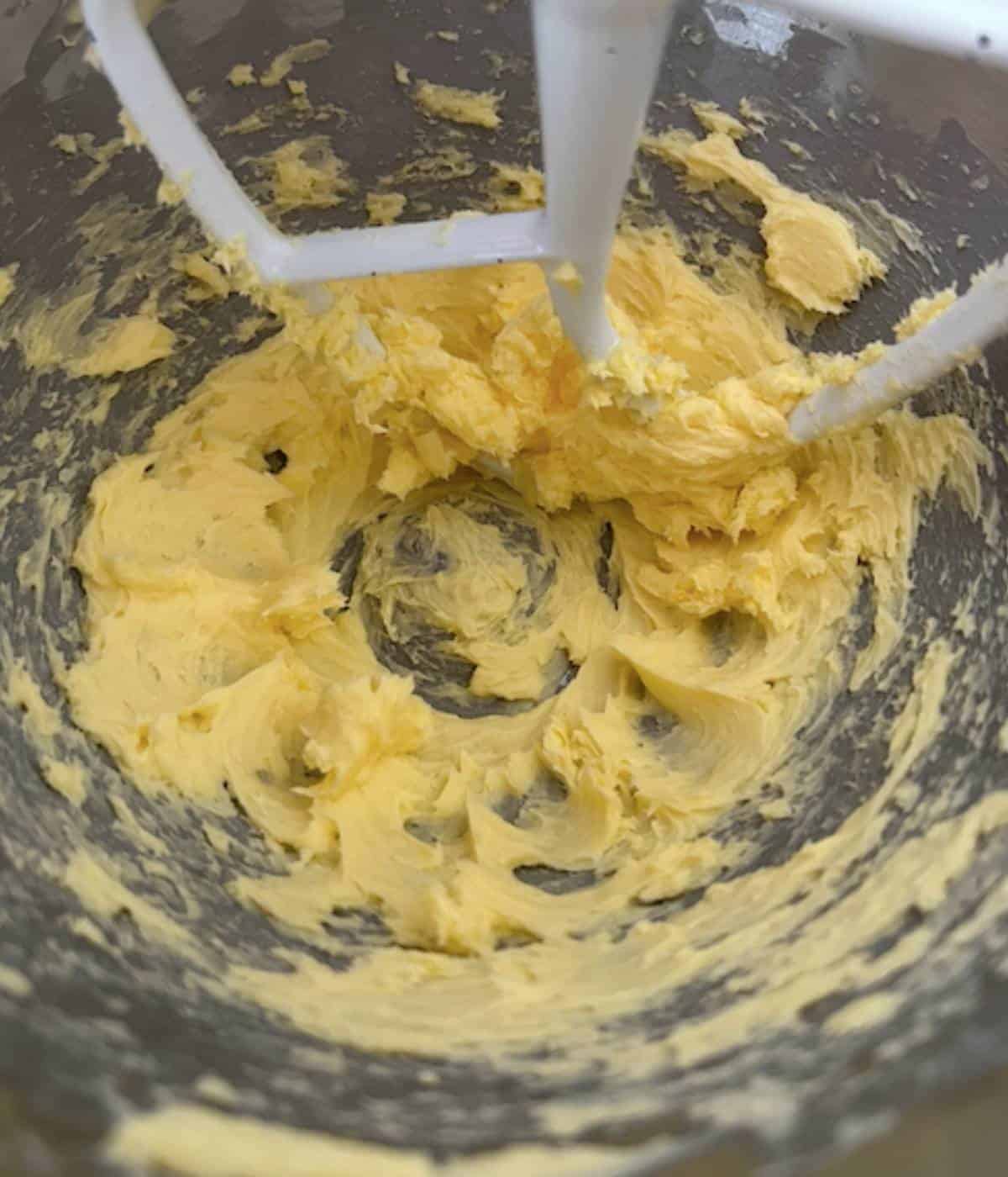 Softened butter whipping in stand mixer.