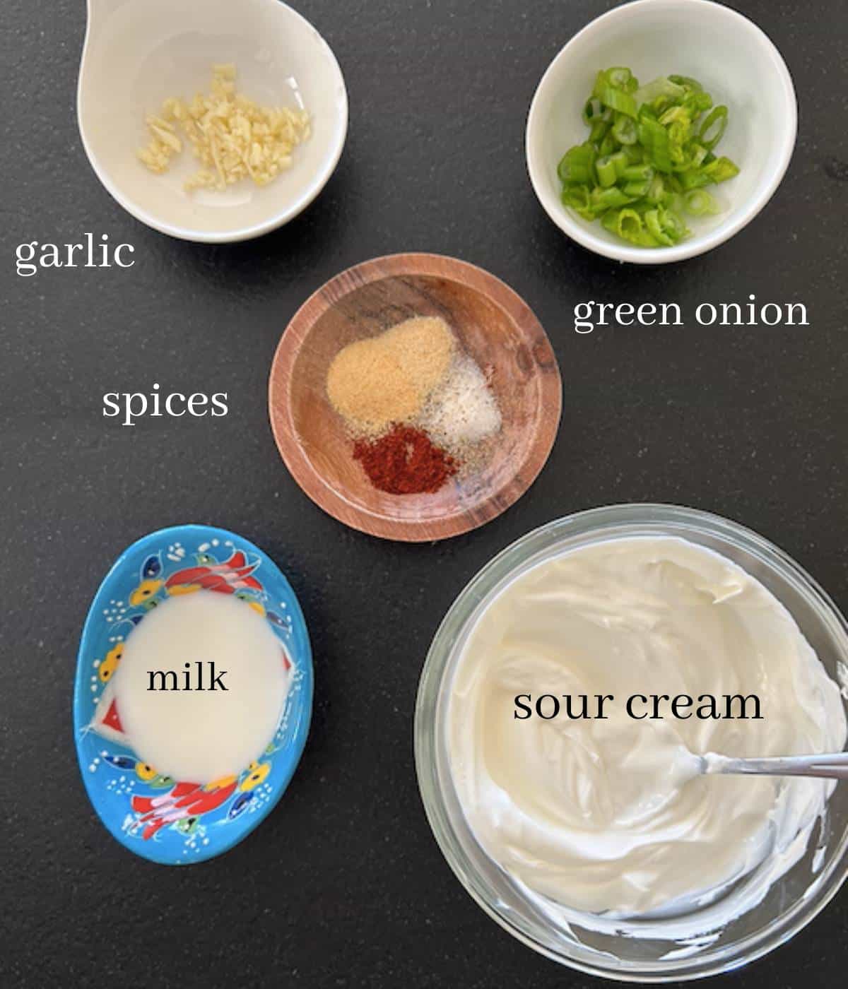 Ingredients on black countertop.