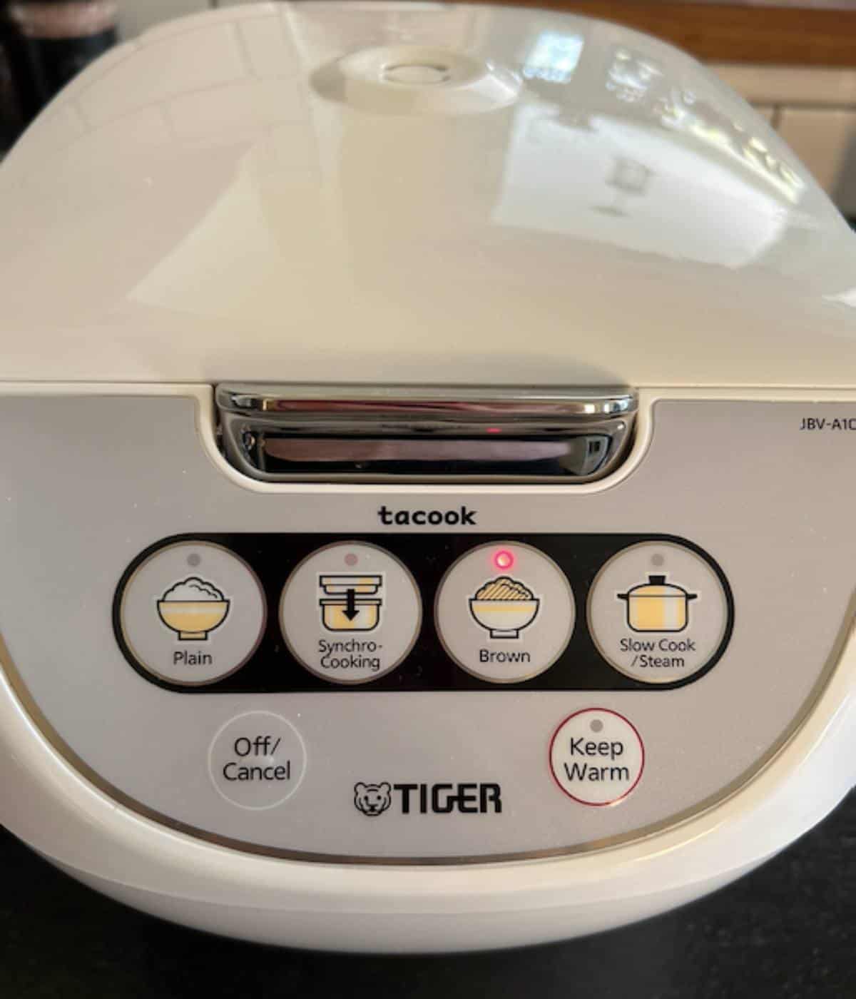 Rice cooker with brown rice selected.