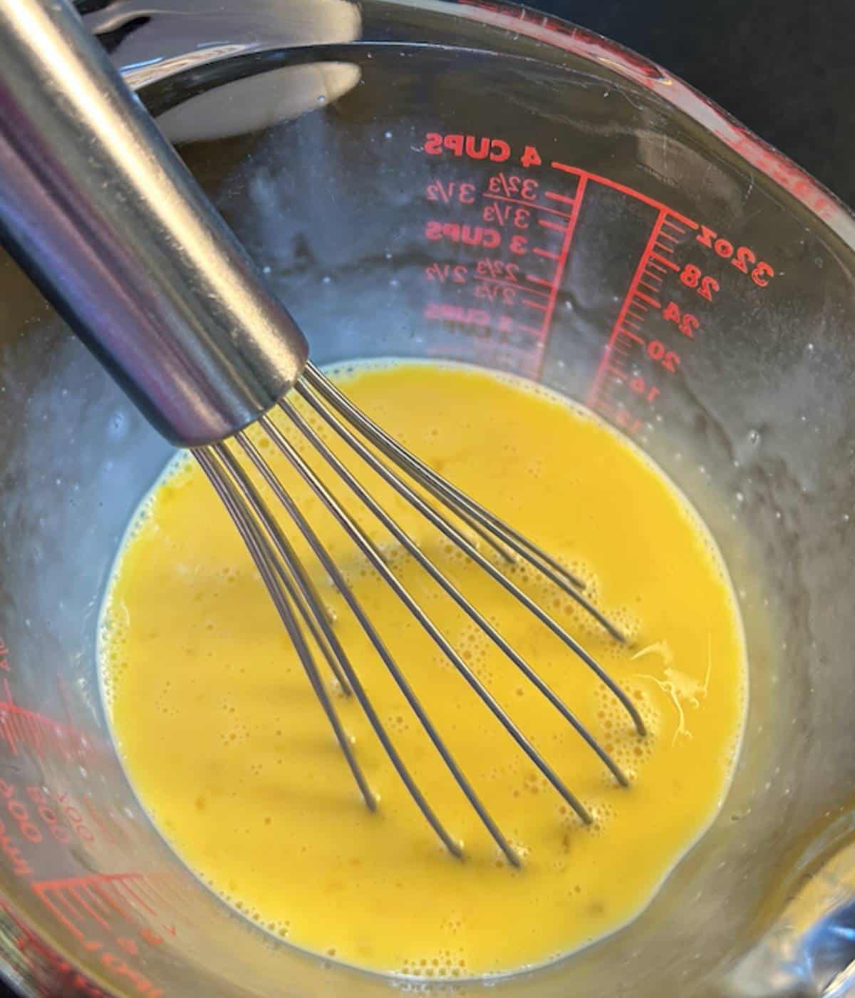 Eggs and milk whisked together.