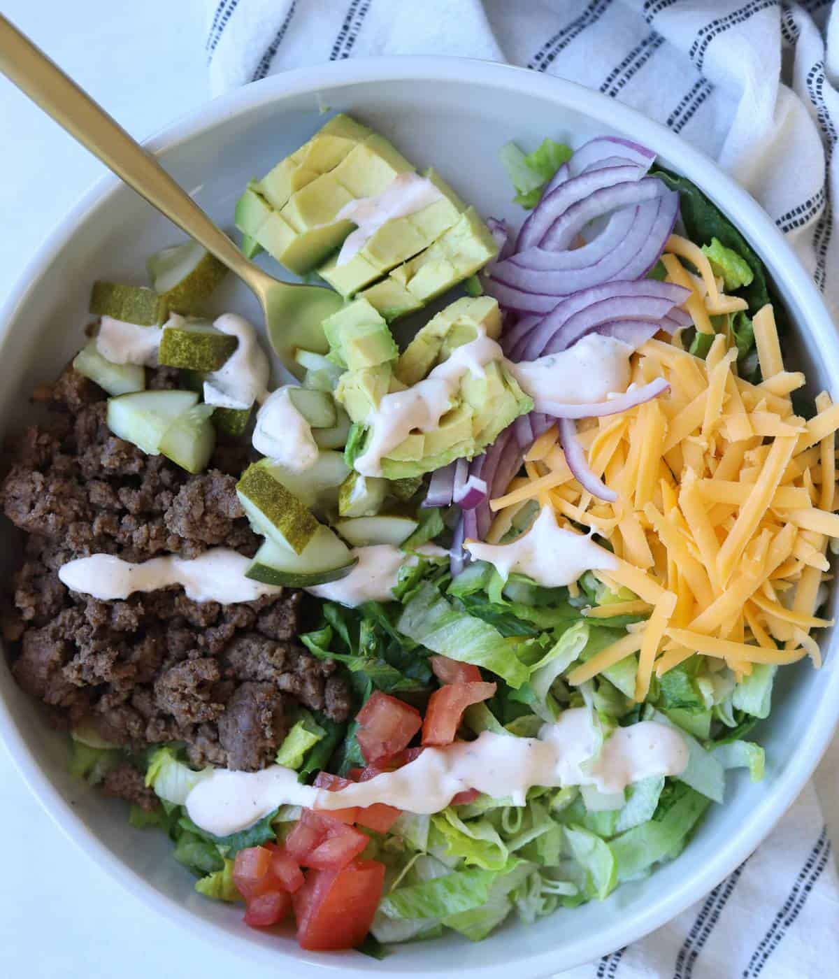 Cheeseburger bowls with ground beef, cheese, and veggies.
