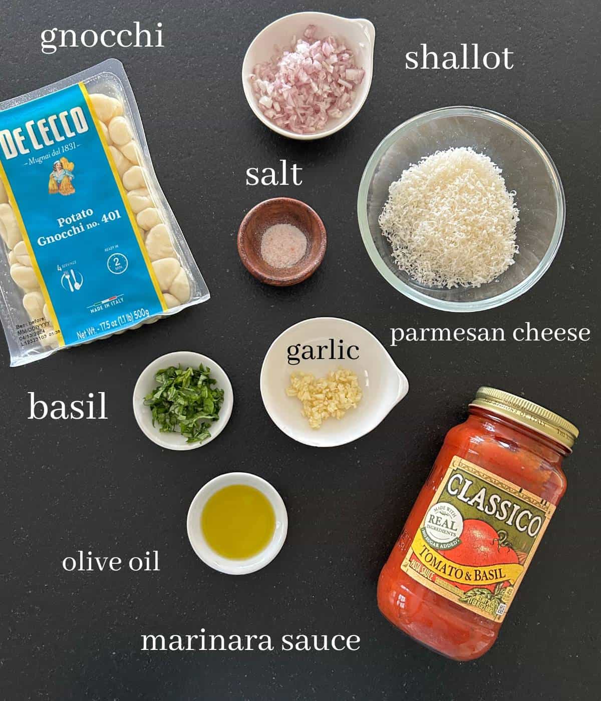 Ingredients for gnocchi marinara on countertop.
