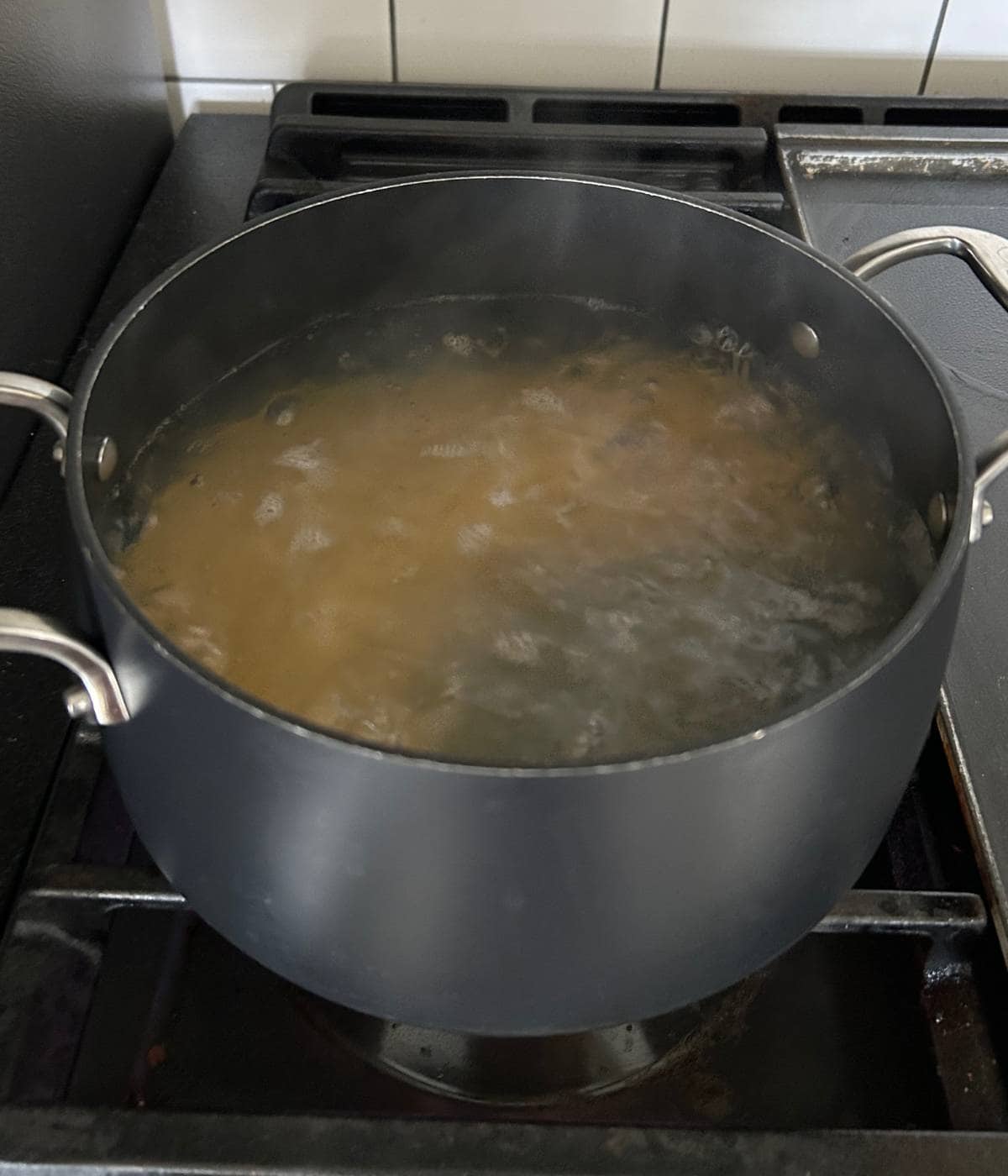 Pasta boiling in pot.