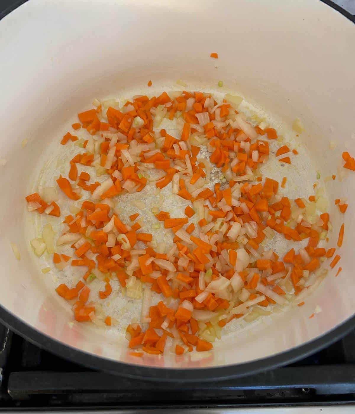 Veggies cooking in pot for turkey chili.