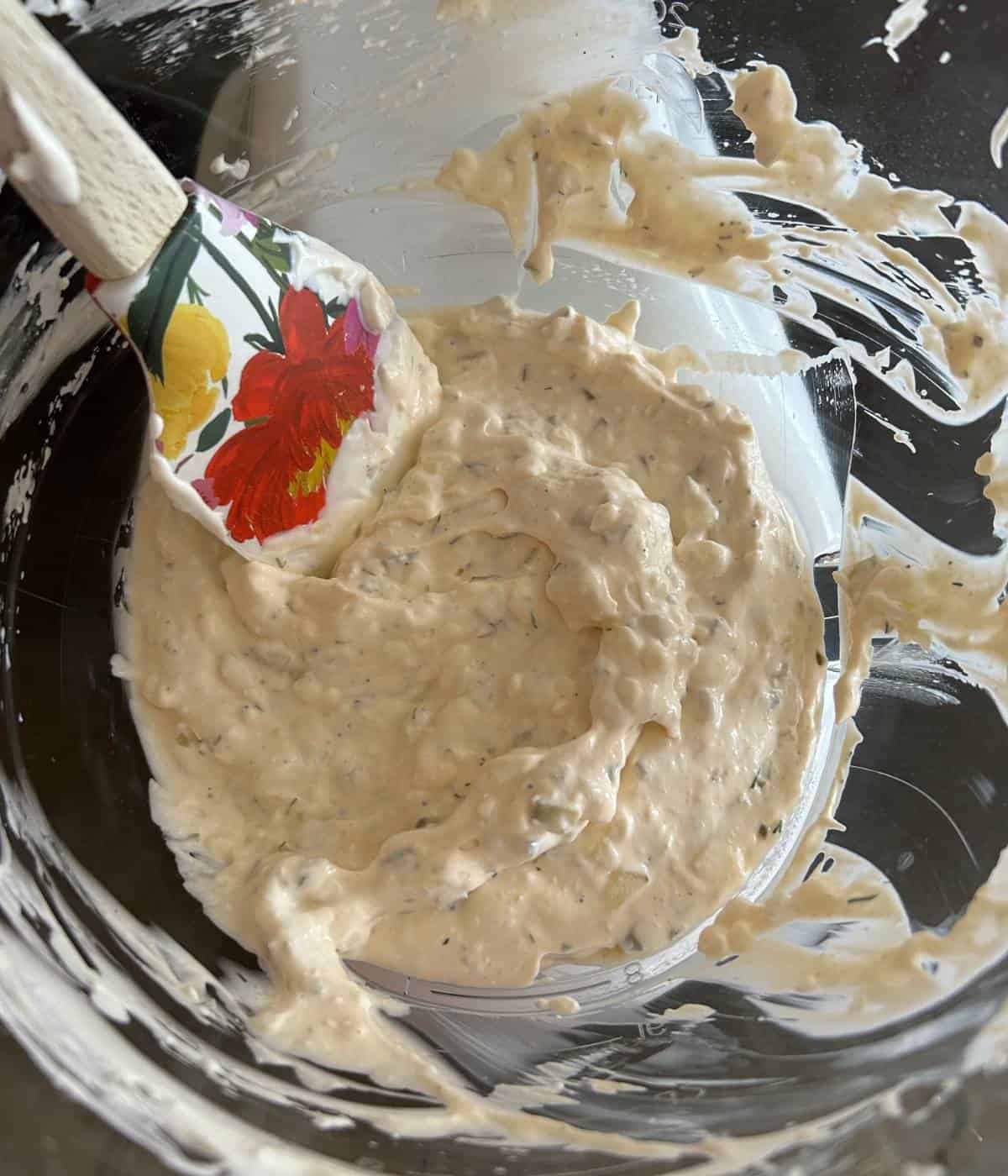 Creamy pickle dip in stand mixer.