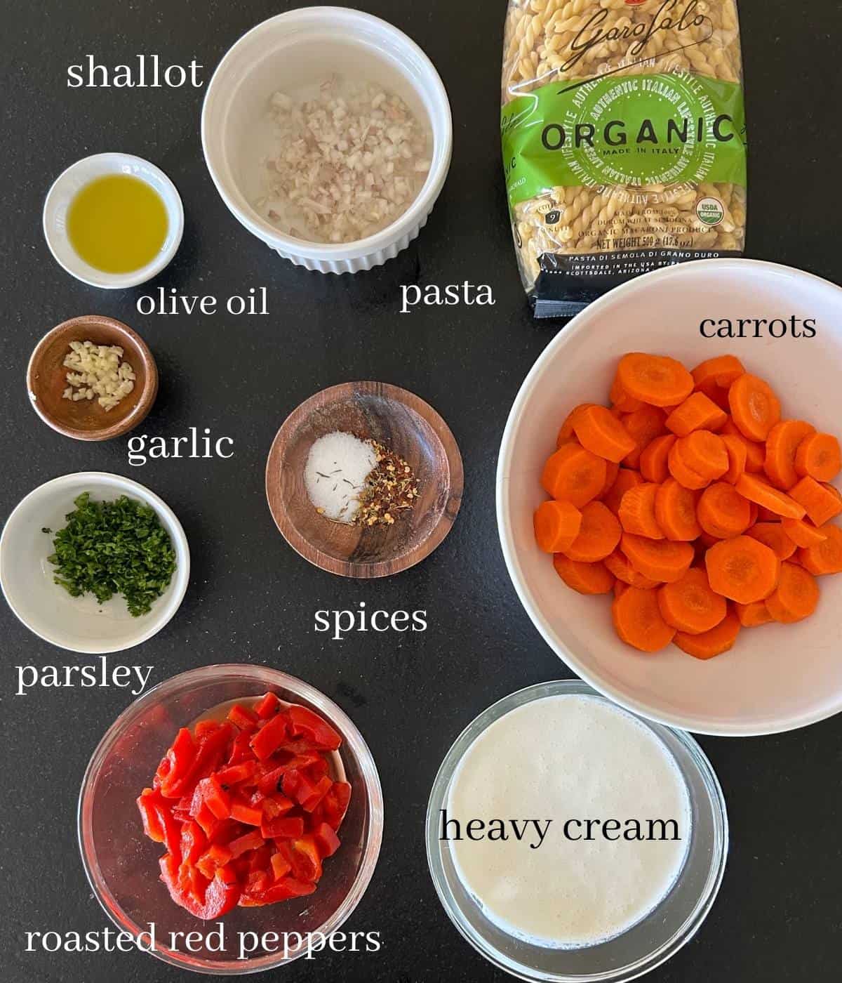 Ingredients for carrot pasta on countertop.