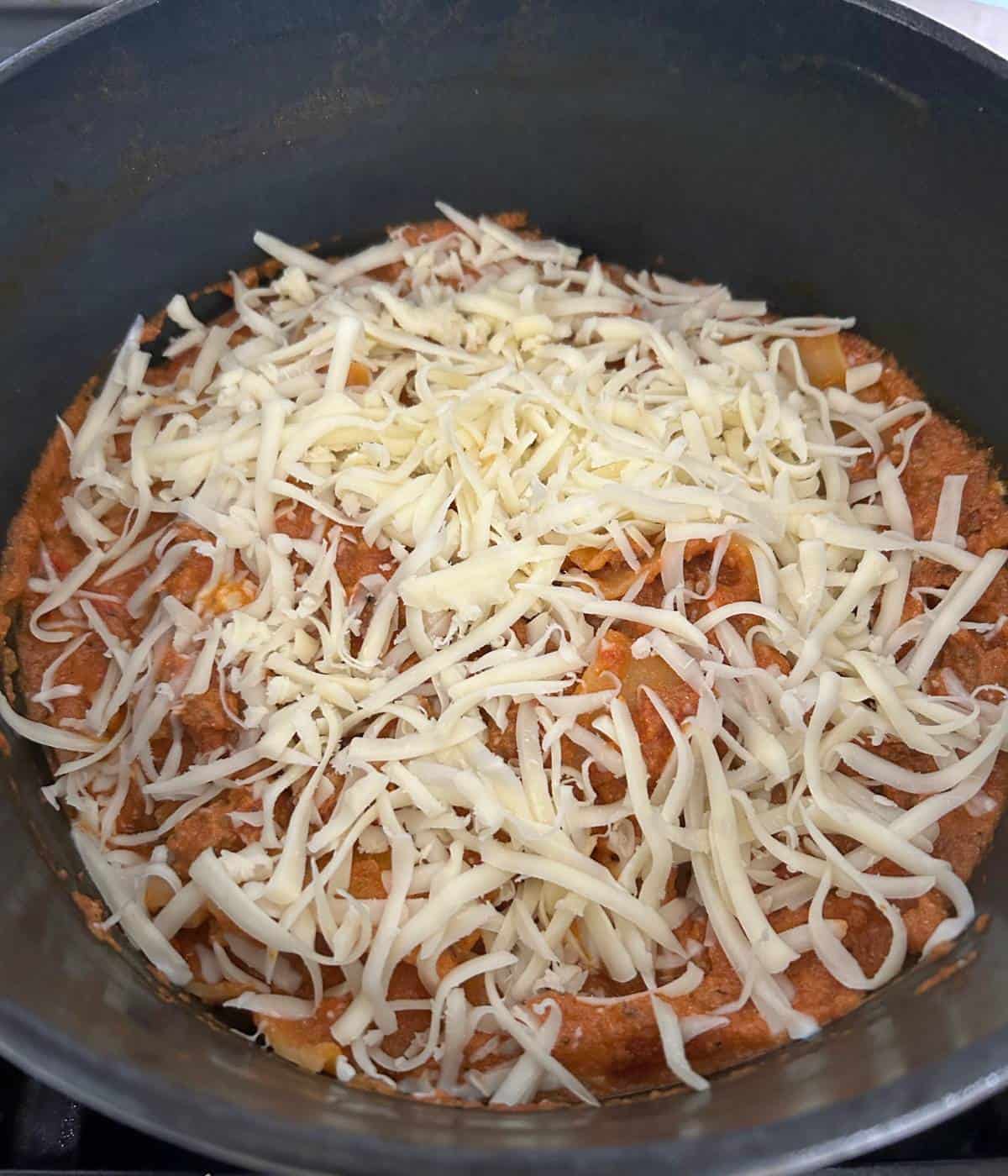 Mozzarella cheese topped on lasagna.