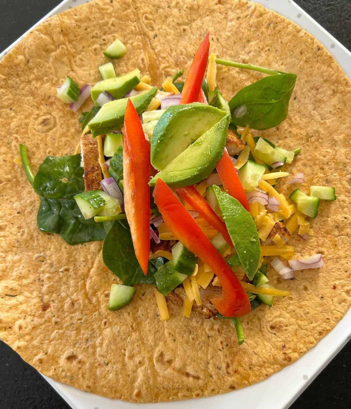 A wrap loaded with ingredients.