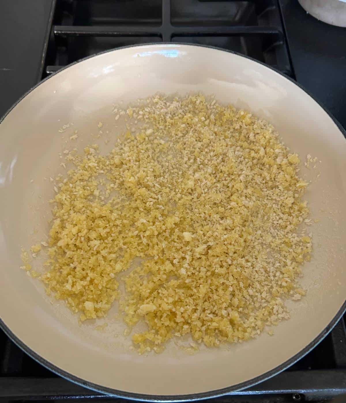 Garlic butter panko topping in skillet.
