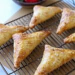 Strawberry turnover pastries on tray.