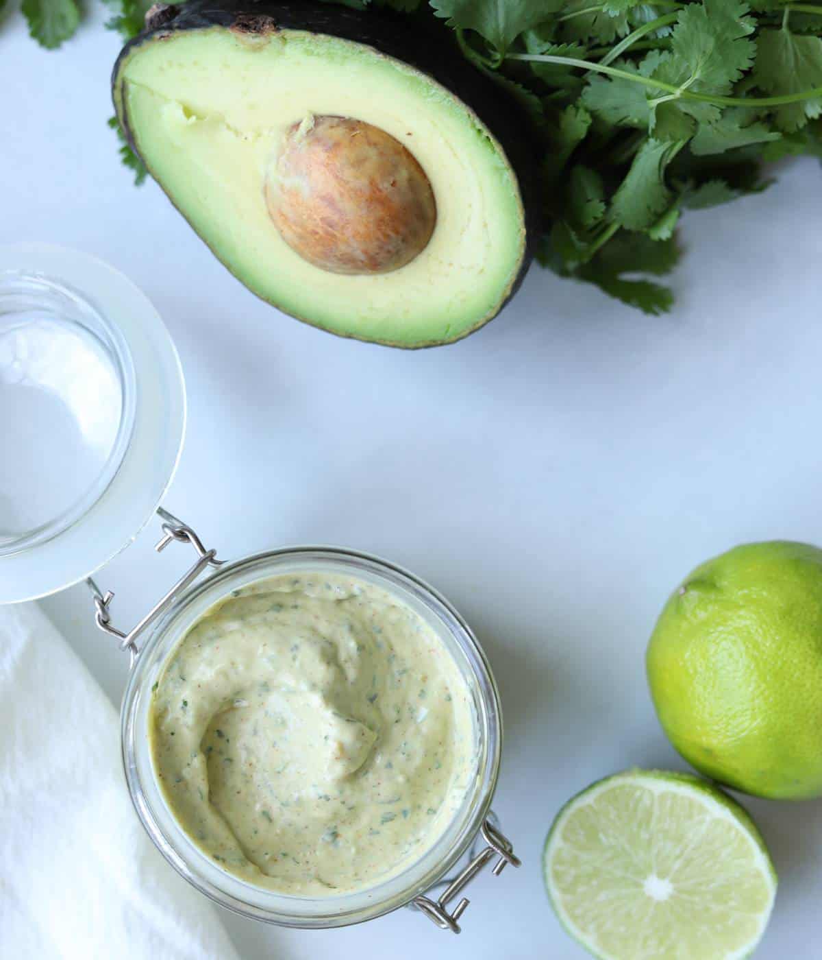 Lime aioli in jar.