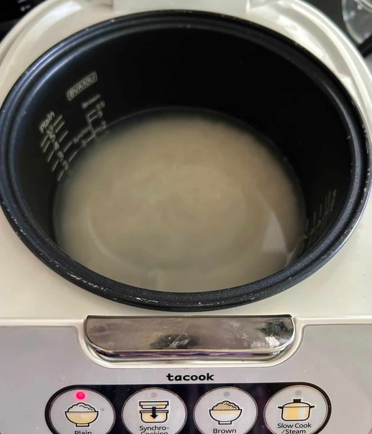 Rice in rice cooker.