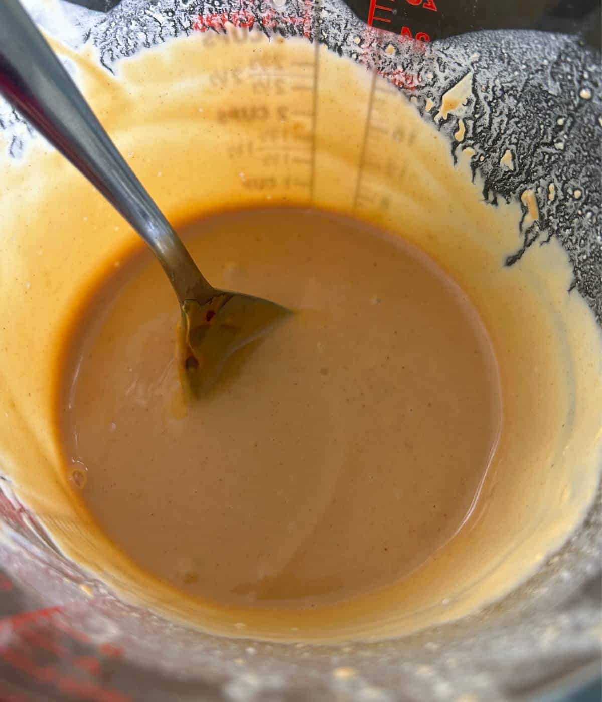 Peanut dressing in pyrex dish.
